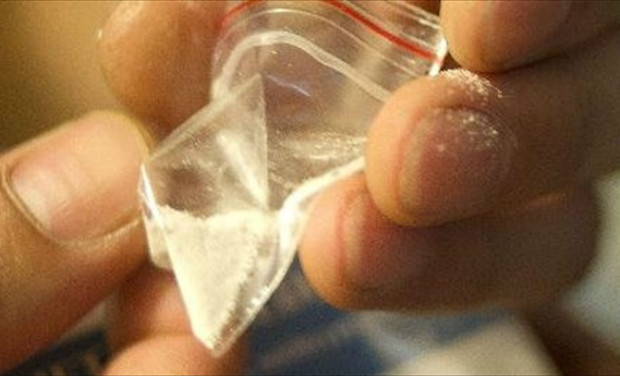 A drug dealer prepares cocaine for sale - AFP/File A drug dealer prepares cocaine for sale - AFP/File